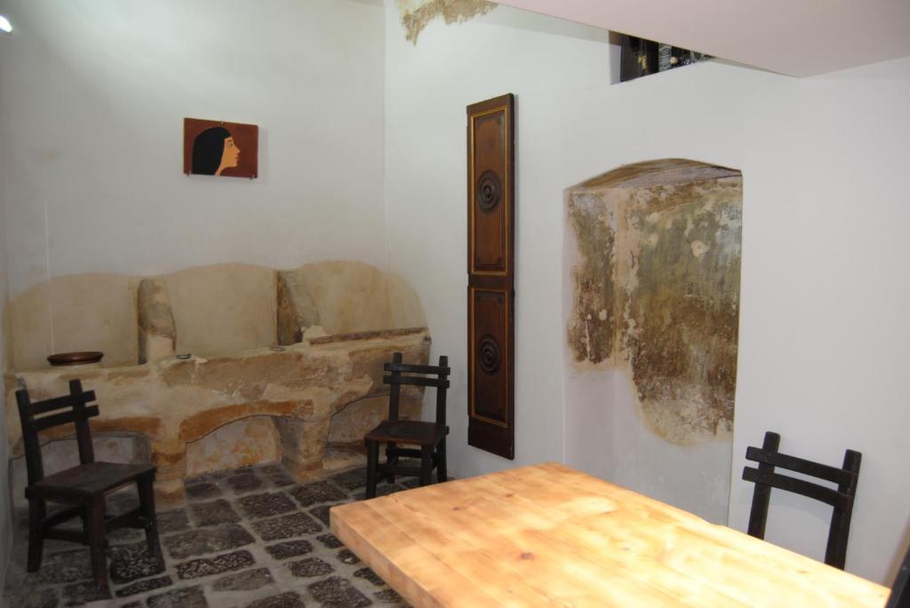 A seating area at B & B Palazzo Maestro & Corte Maestro rooms