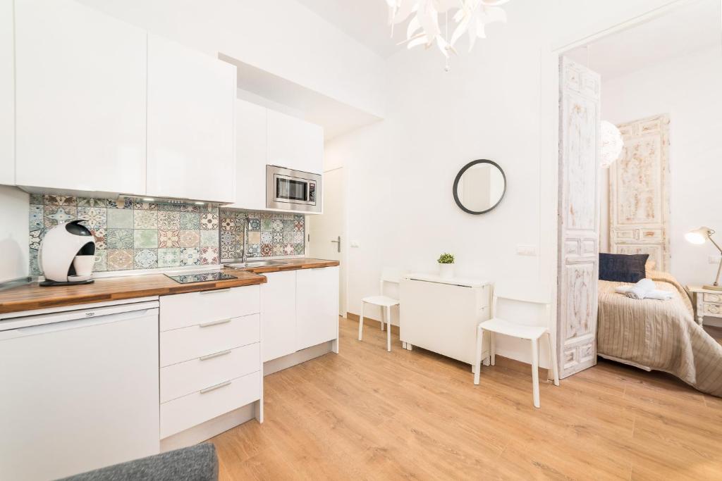 Postel nebo postele na pokoji v ubytování Suite Homes Uncibay Square