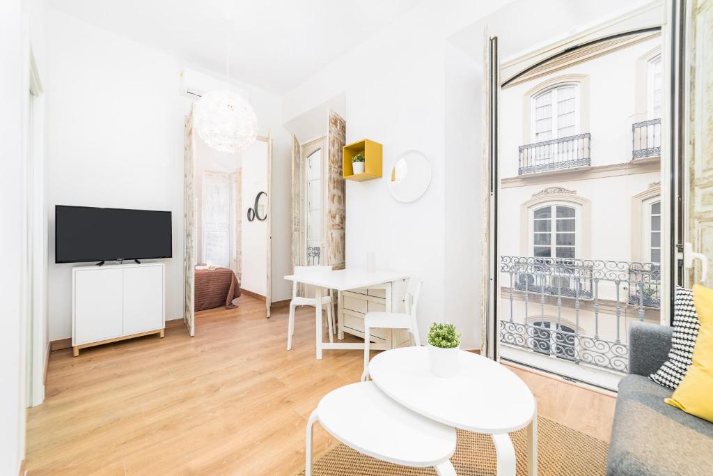 TV a/nebo společenská místnost v ubytování Suite Homes Uncibay Square