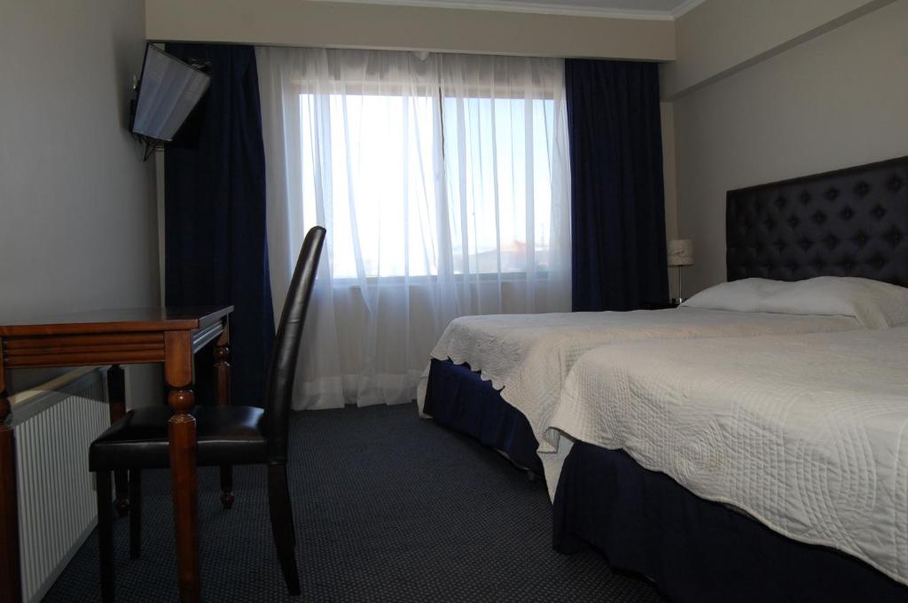 Postel nebo postele na pokoji v ubytování Hotel Econohotel