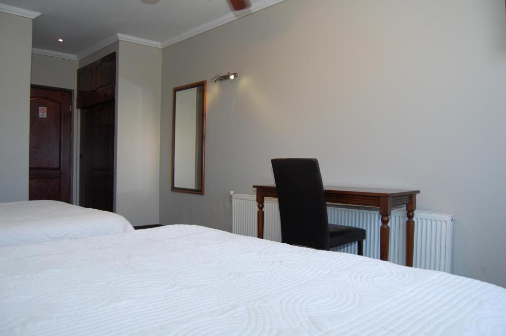 Postel nebo postele na pokoji v ubytování Hotel Econohotel