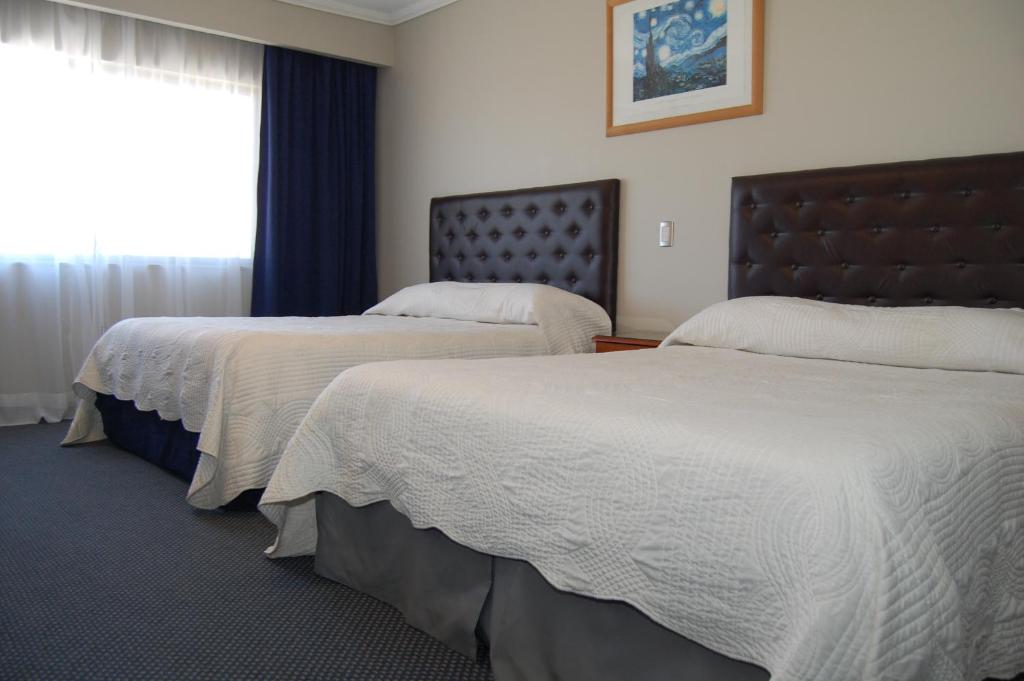 Cama o camas de una habitación en Hotel Econohotel