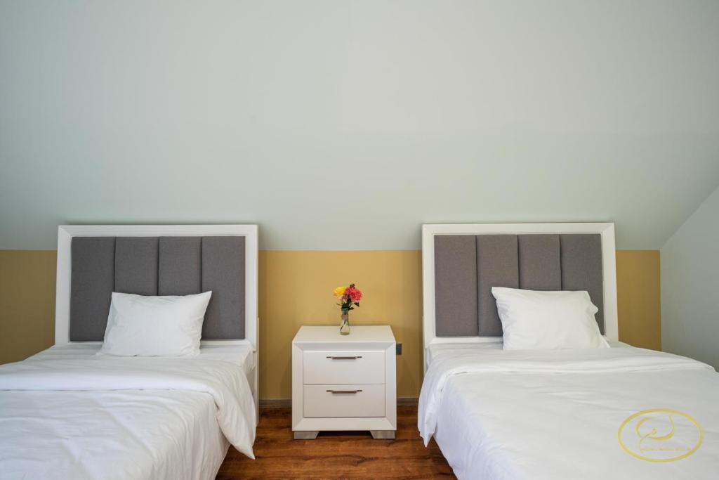Postel nebo postele na pokoji v ubytování Hong Mon Villa