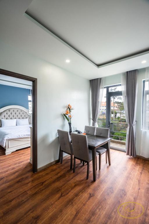 Postel nebo postele na pokoji v ubytování Hong Mon Villa