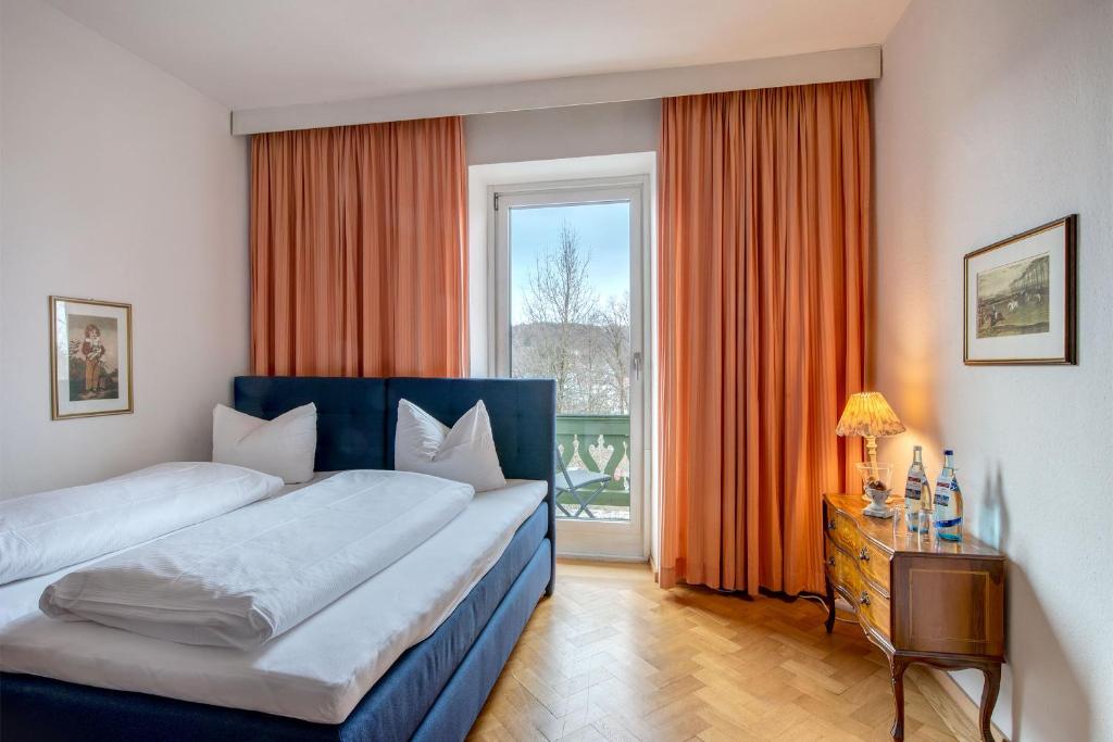 Postel nebo postele na pokoji v ubytování Hotel Kolbergarten