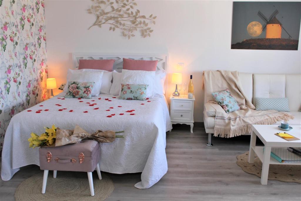 Cama o camas de una habitación en Apartamentos Oncemolinos con desayuno
