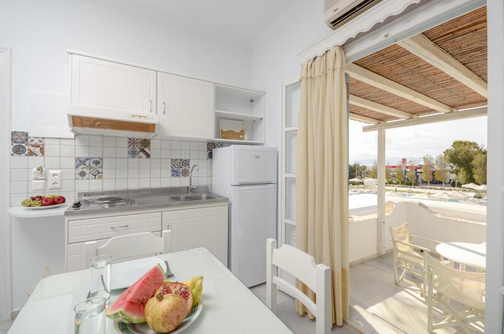 Kuchyň nebo kuchyňský kout v ubytování Birikos Studios & Apartments