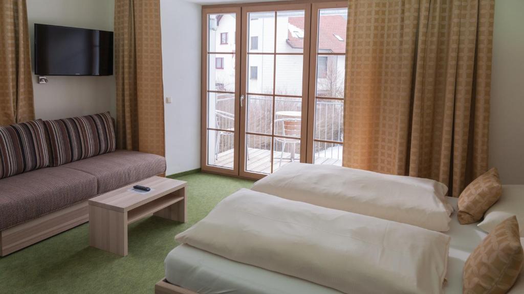 Postel nebo postele na pokoji v ubytování Familiengasthof Maier