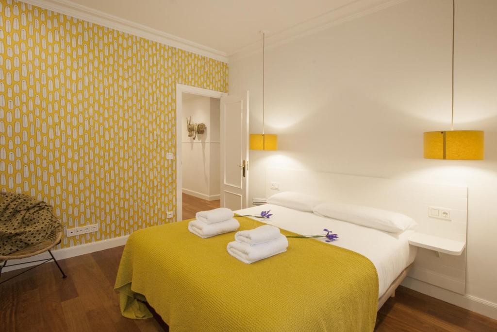 Postel nebo postele na pokoji v ubytování Bare by Oldtown SS Apartments