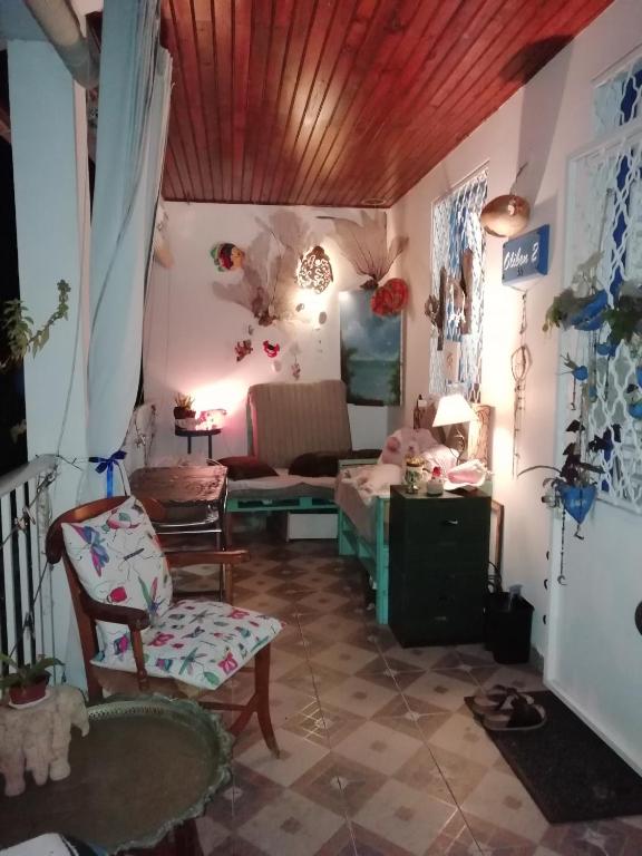 Posezení v ubytování Chambre d'hôte la Calebasse