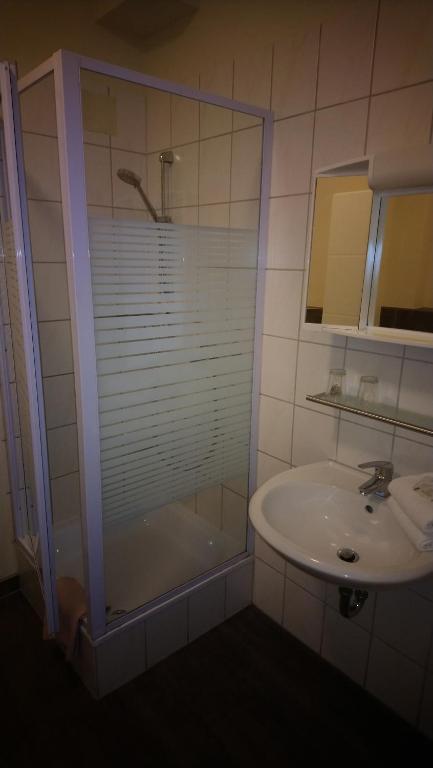 Koupelna v ubytování Hotel Schillerquartier