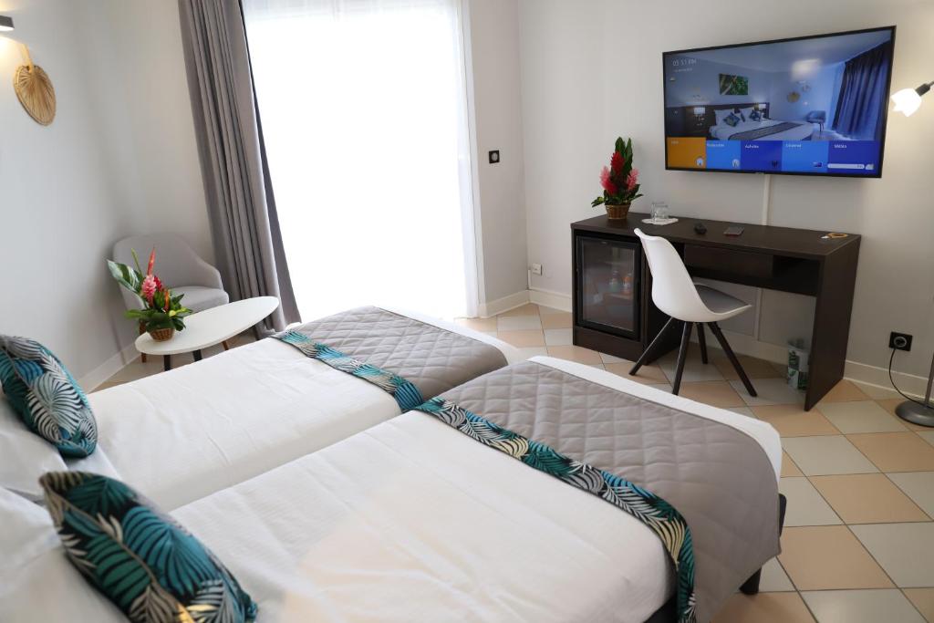 Postel nebo postele na pokoji v ubytování Hôtel Saint-Georges