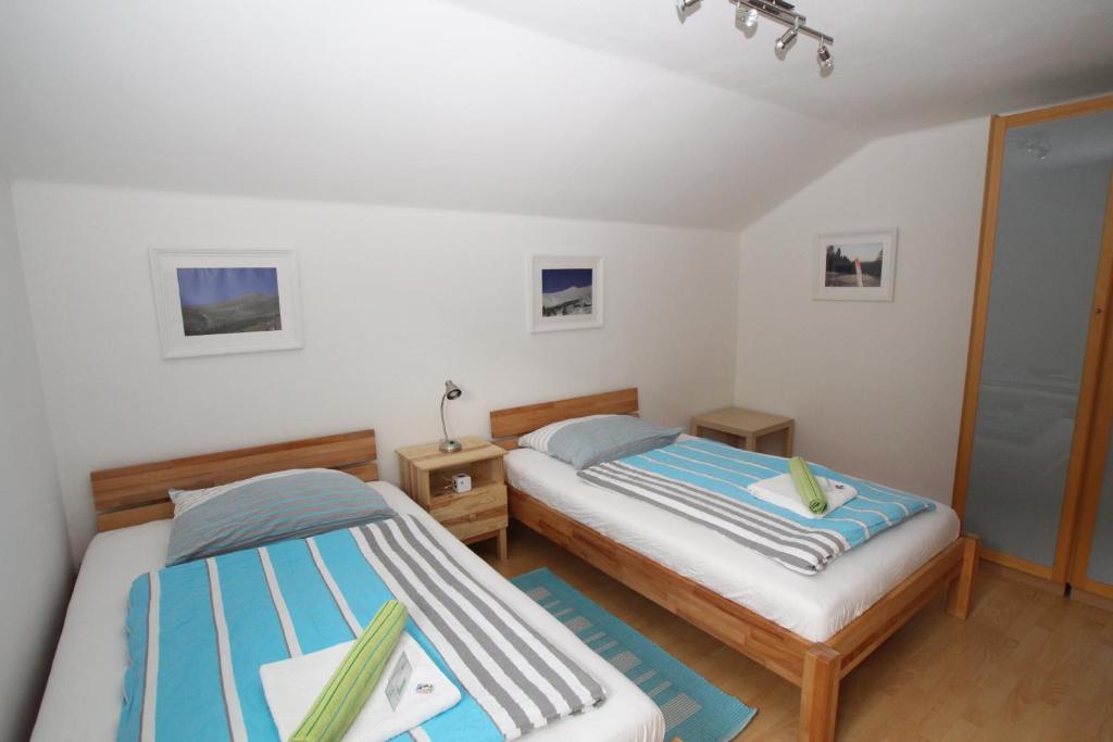 Postel nebo postele na pokoji v ubytování HH-Apartments