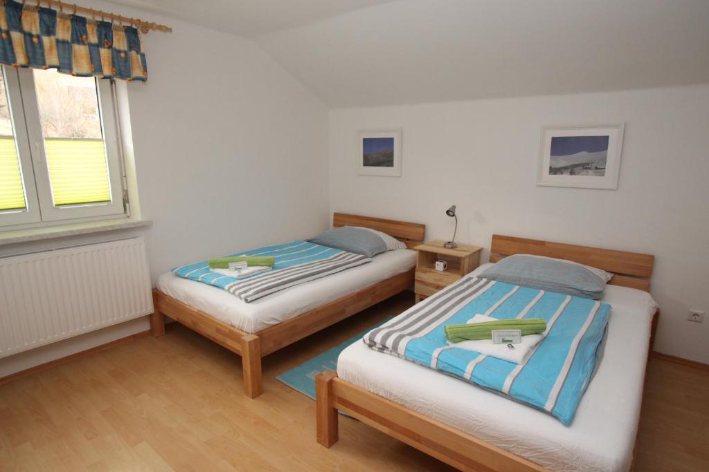 Postel nebo postele na pokoji v ubytování HH-Apartments