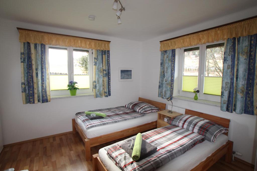 Postel nebo postele na pokoji v ubytování HH-Apartments