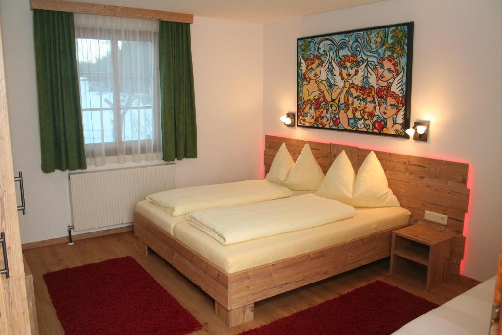 Letto o letti in una camera di Nattererboden