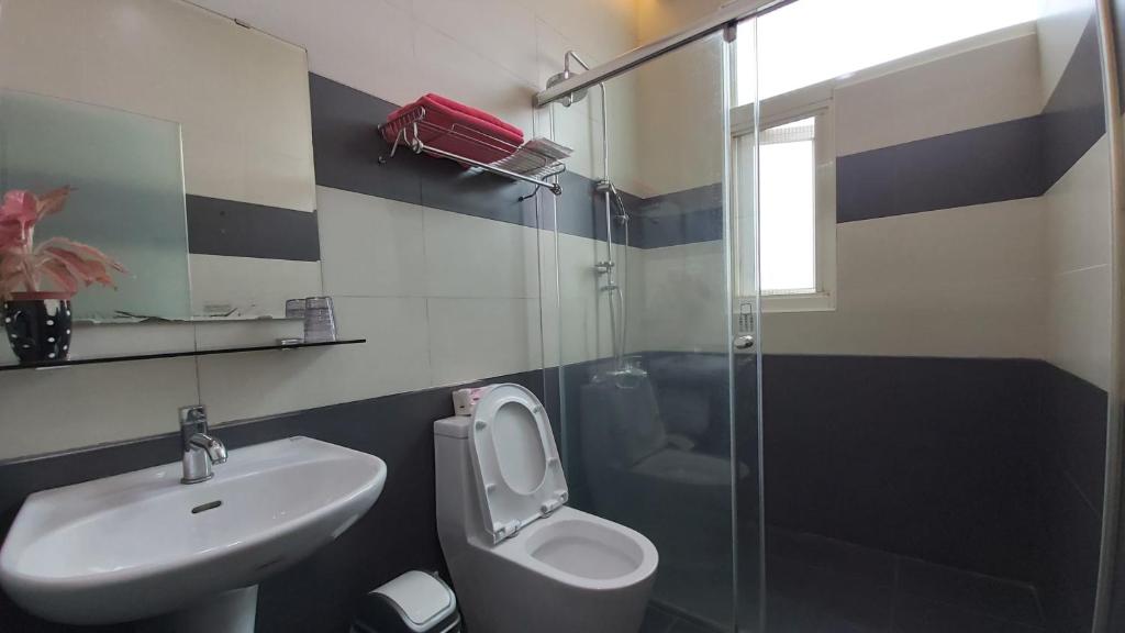 Koupelna v ubytování ChaoPingJia Fengge Guesthouse