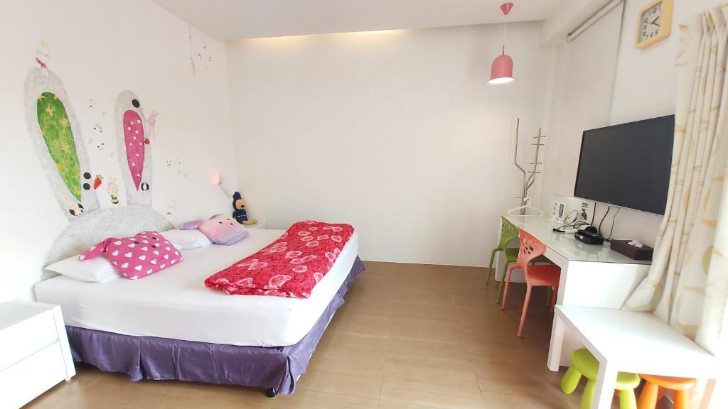Postel nebo postele na pokoji v ubytování ChaoPingJia Fengge Guesthouse
