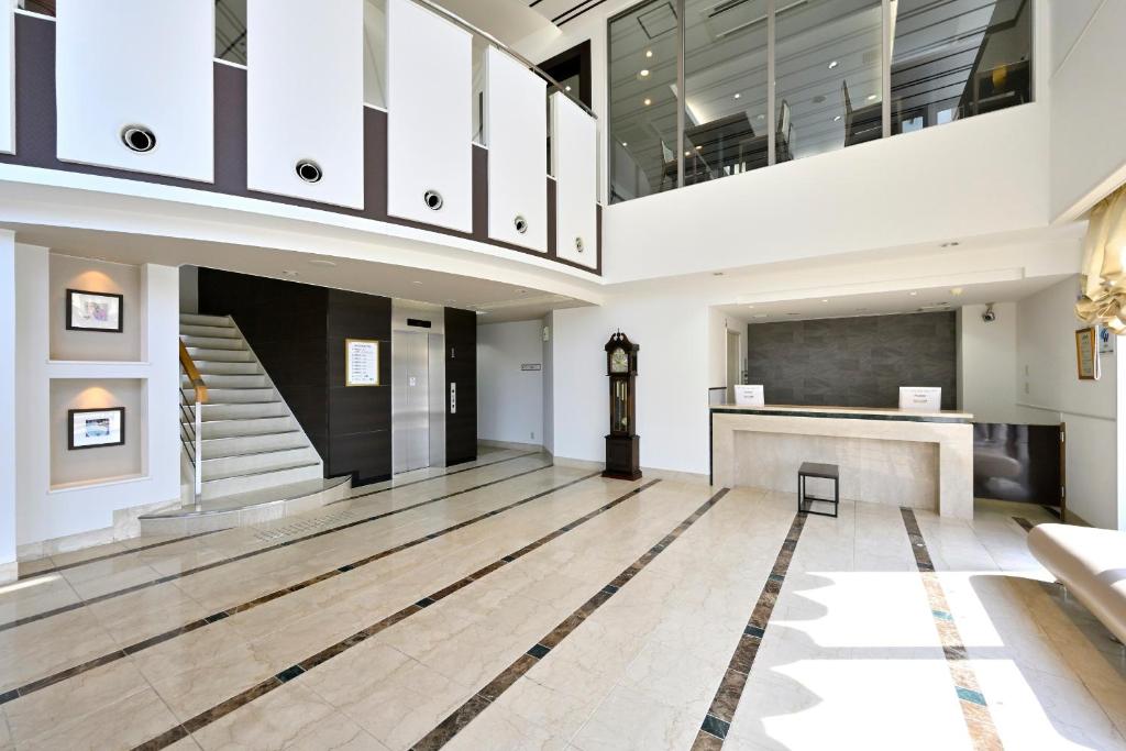 Kuchyň nebo kuchyňský kout v ubytování Saijo Urban Hotel