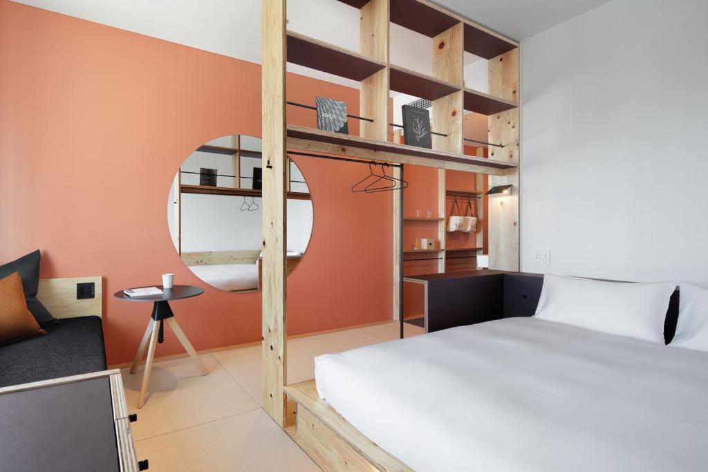 Postel nebo postele na pokoji v ubytování BEB5 Tsuchiura by Hoshino Resorts