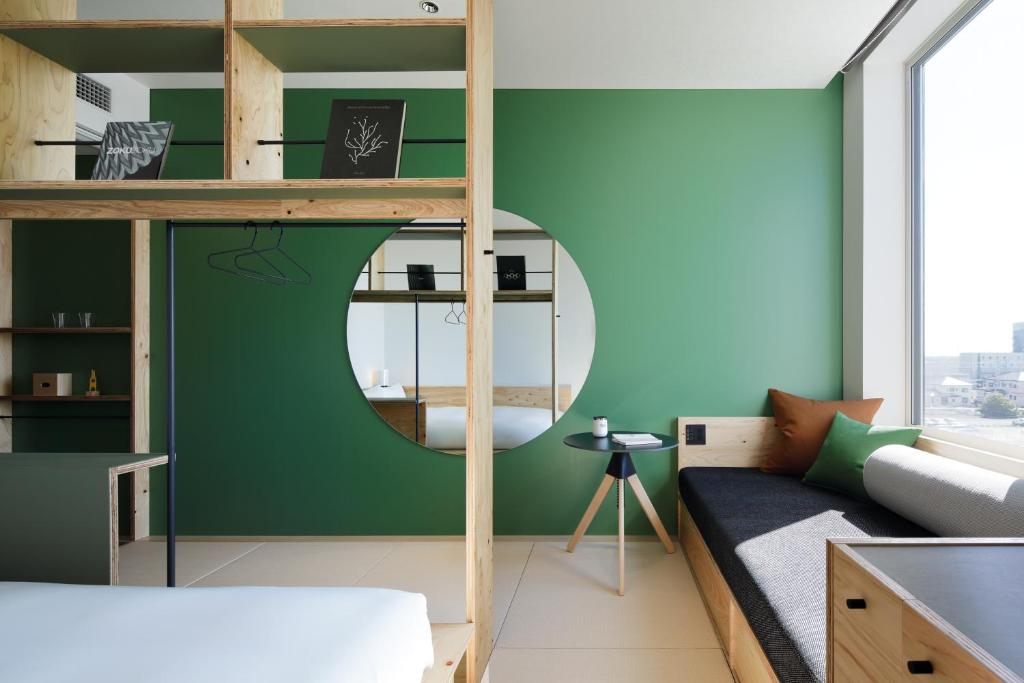 Postel nebo postele na pokoji v ubytování BEB5 Tsuchiura by Hoshino Resorts
