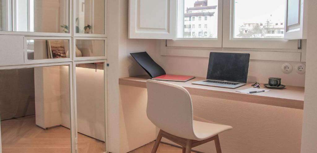 A kitchen or kitchenette at The Boc Suites