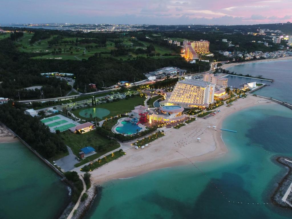 an aerial view of a resort on the beach at Sheraton Okinawa Sunmarina Resort in Onna