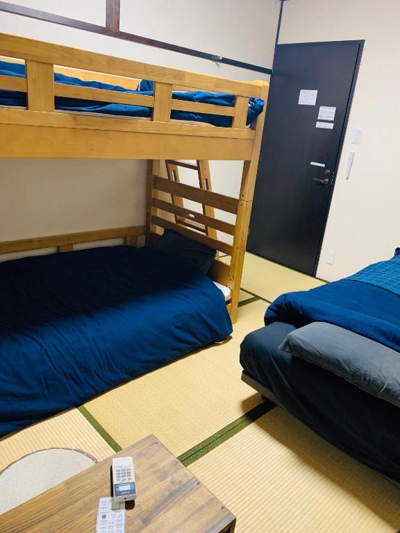 Postel nebo postele na pokoji v ubytování Hilo Hostel