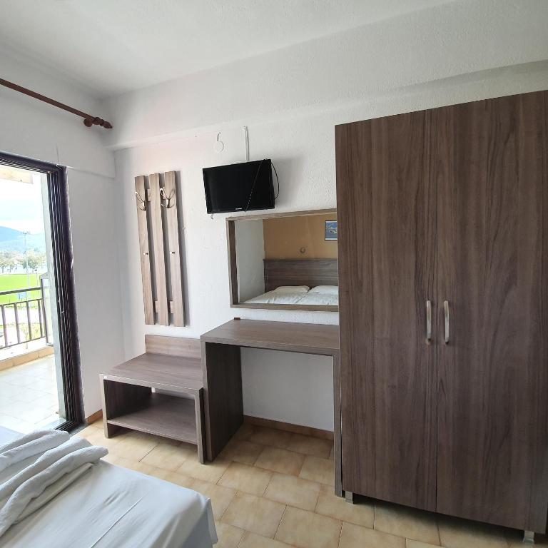 A bed or beds in a room at Studios Vaso