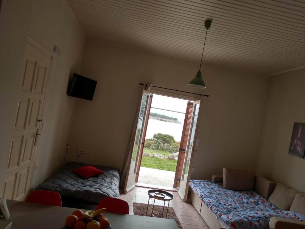 A bed or beds in a room at Marathi Blue