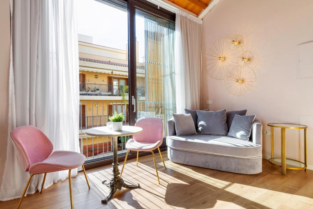 A seating area at Apartamentos Casapalma Centro Histórico