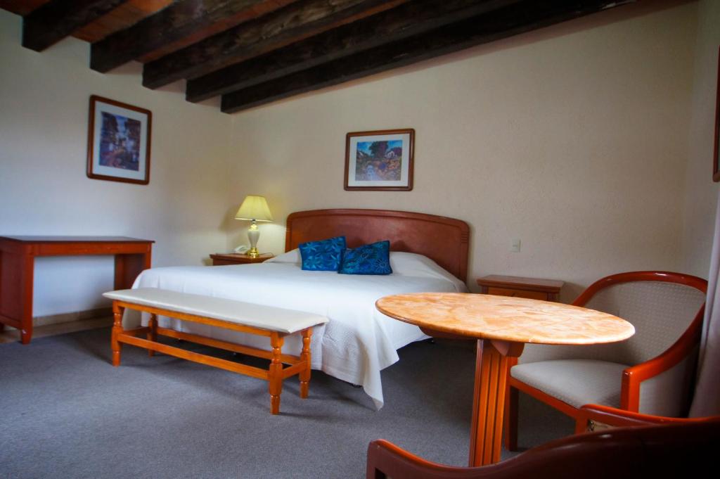Postel nebo postele na pokoji v ubytování Villa Caltengo