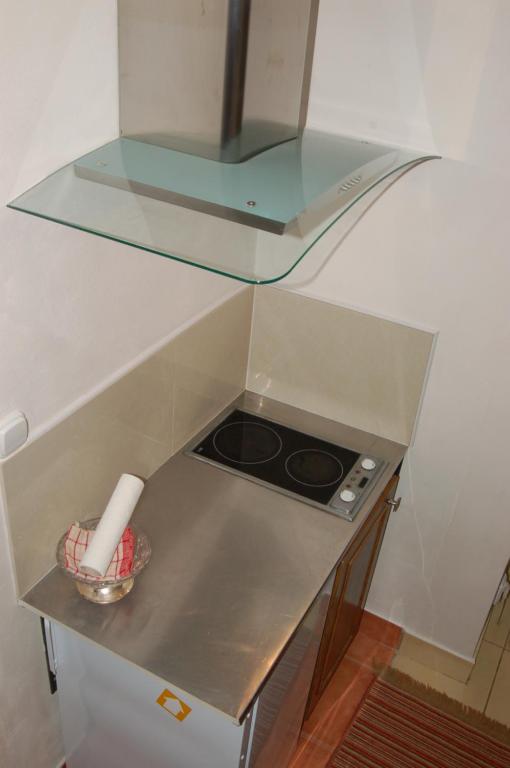 Kuchyňa alebo kuchynka v ubytovaní Apartman Solisko