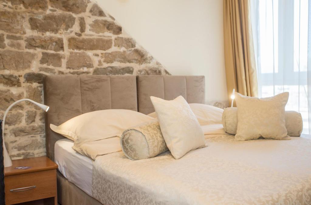 Postel nebo postele na pokoji v ubytování Authentic Luxury Rooms