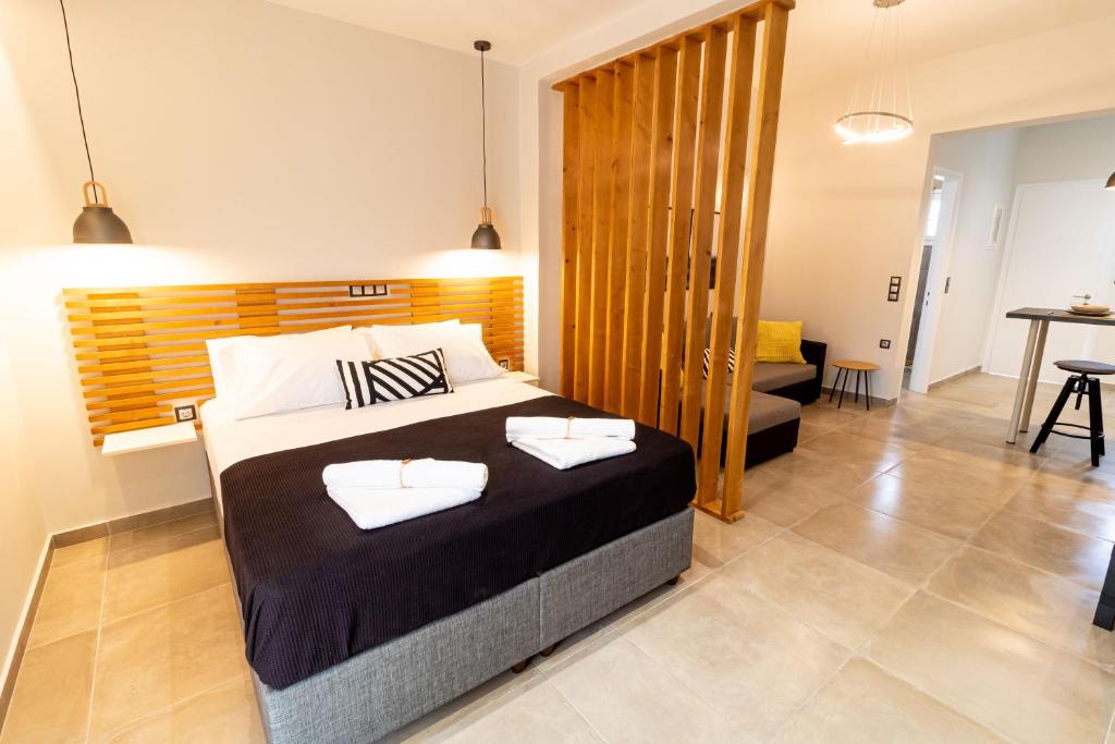 A bed or beds in a room at Elysian Studios