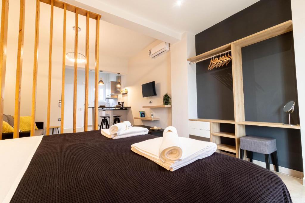 A bed or beds in a room at Elysian Studios
