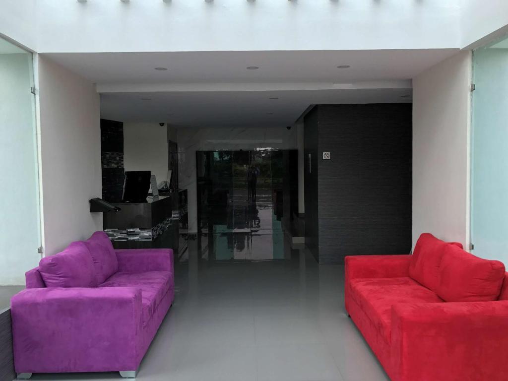 Un lugar para sentarse en Best Western Plus Metepec & Suites