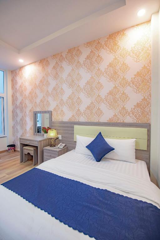 Khanh Uyen 1 Hotel客房内的一张或多张床位