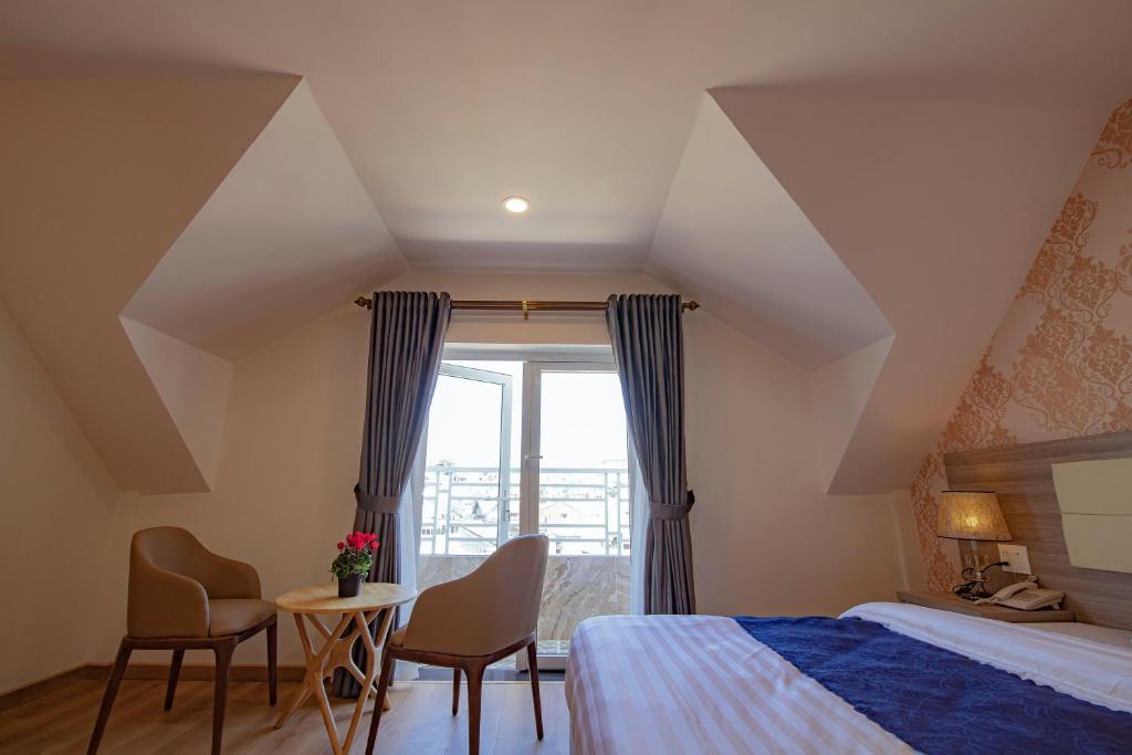 Khanh Uyen 1 Hotel客房内的一张或多张床位