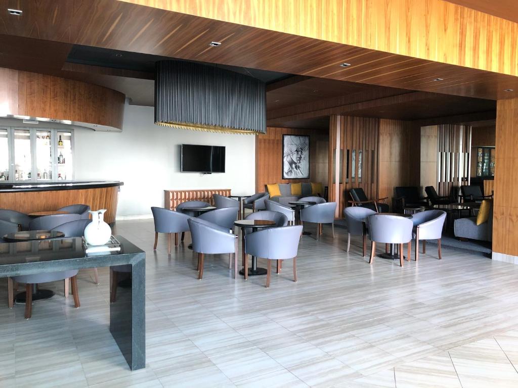 TV a/nebo společenská místnost v ubytování Hotel Real de Minas Bajio
