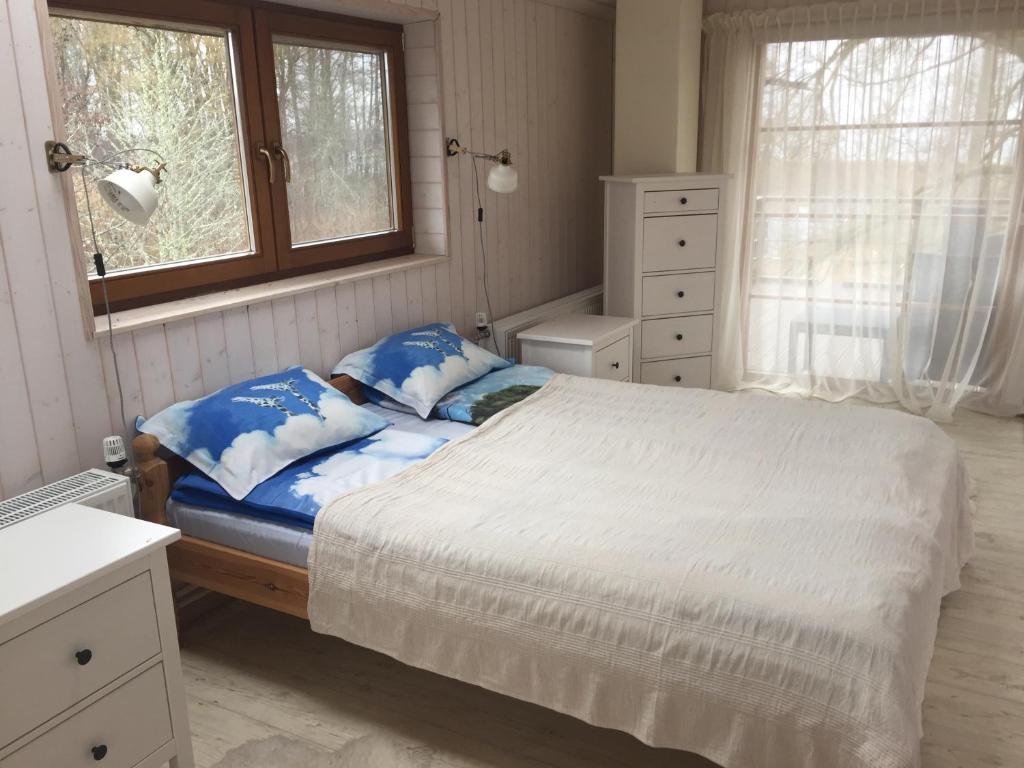 Postel nebo postele na pokoji v ubytování Mokko Lakehouse