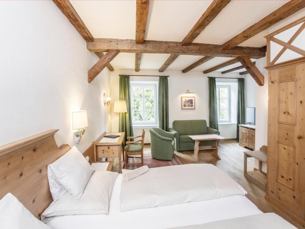 Postel nebo postele na pokoji v ubytování Hotel Tiefenbrunner