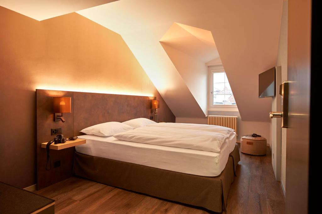 Postel nebo postele na pokoji v ubytování The HEY HOTEL