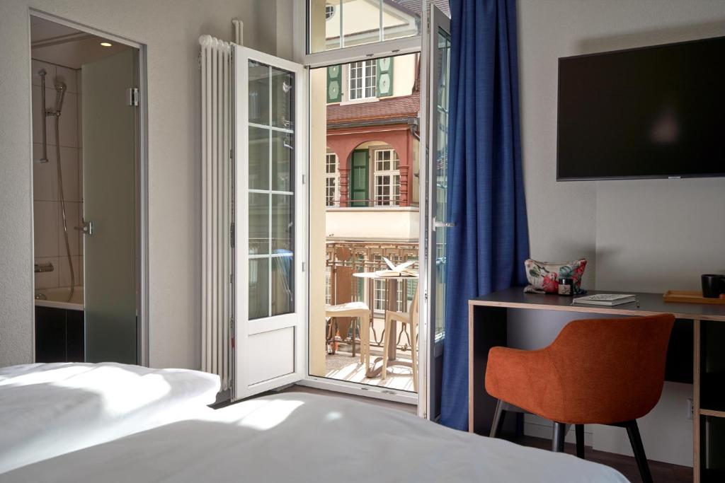 Postel nebo postele na pokoji v ubytování The HEY HOTEL