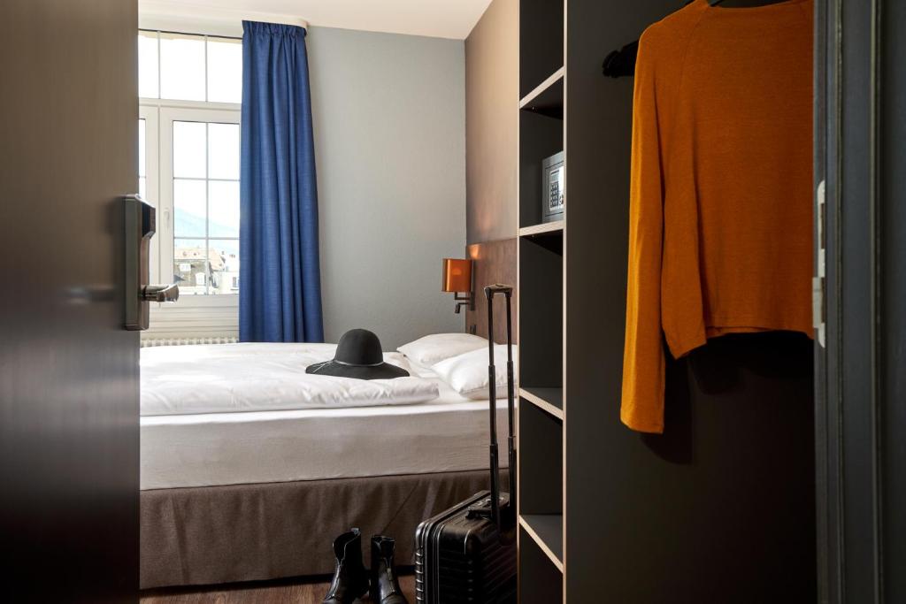 Postel nebo postele na pokoji v ubytování The HEY HOTEL