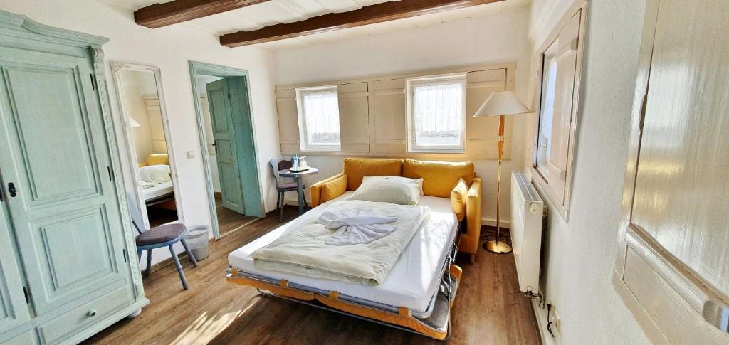 Postel nebo postele na pokoji v ubytování Hotel Zittauer Hütte