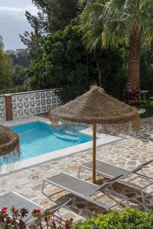 The swimming pool at or close to Boutique X Pueblo, Benalmádena
