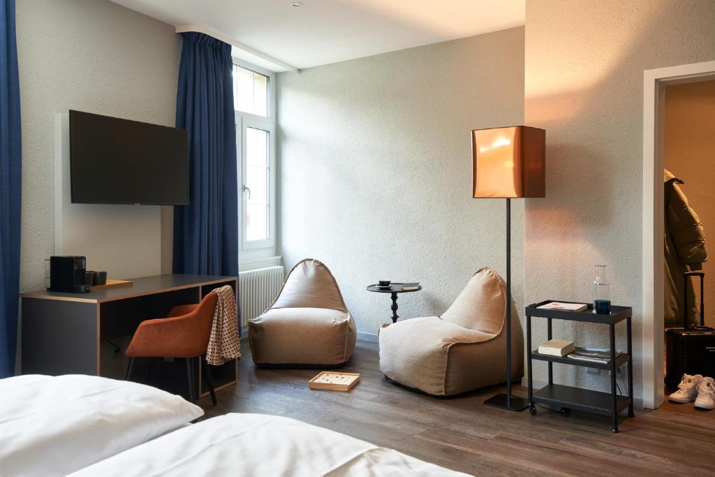 TV a/nebo společenská místnost v ubytování The HEY HOTEL