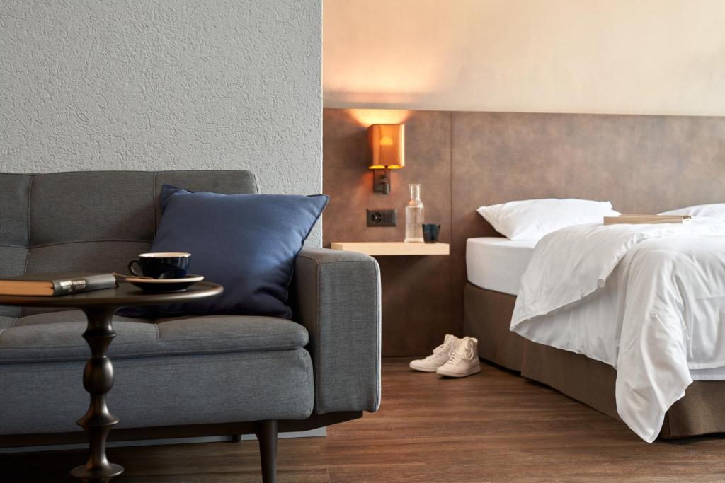 Postel nebo postele na pokoji v ubytování The HEY HOTEL