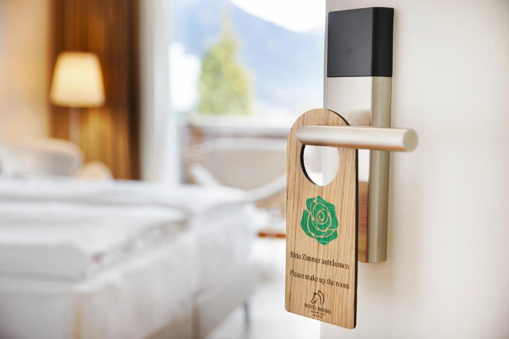 Postel nebo postele na pokoji v ubytování Hotel Rössli Gourmet & Spa